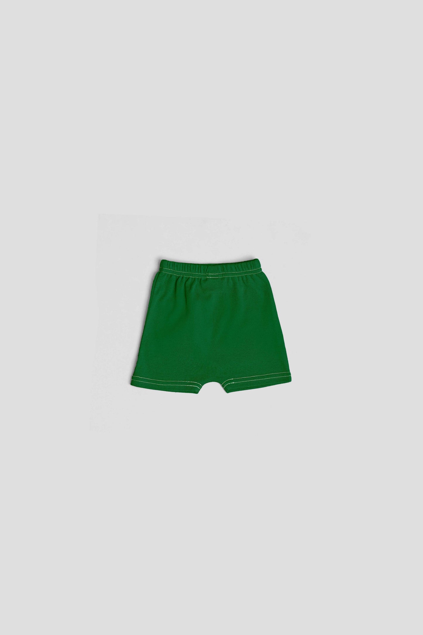 Yawning yolk  infant biker shorts in organic cotton amazon green