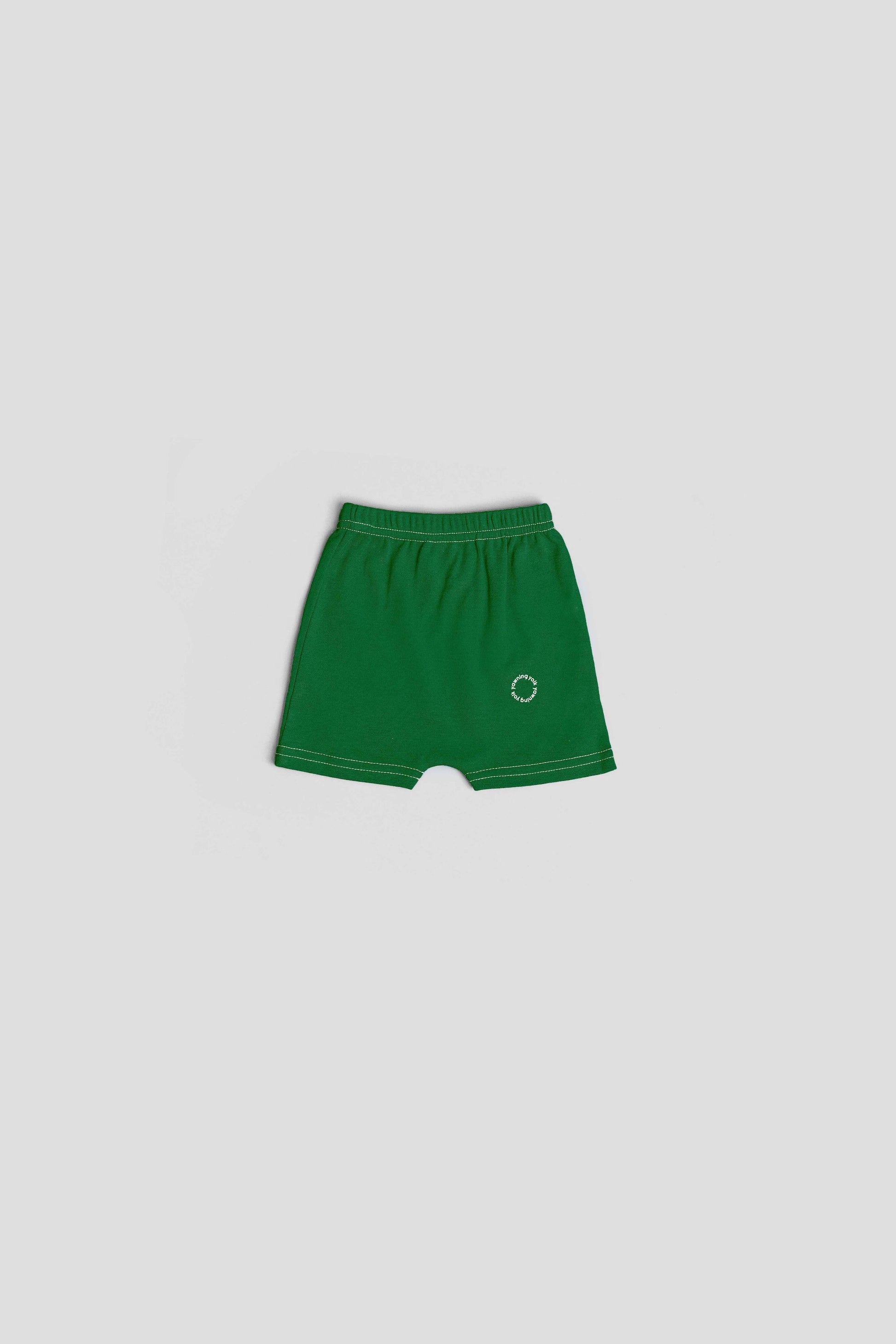 Yawning yolk  infant biker shorts in organic cotton amazon green